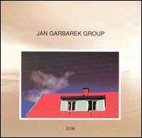 Jan Garbarek - Photo with Blue Sky, White Cloud, Wires, Windows and a Red Roof