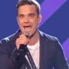 Robbie Williams isi lanseaza joc de karaoke