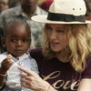 Madonna se gandeste sa mai adopte un copil din Malawi