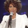Whitney Houston, la un pas de a fi data afara din avion