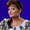 Cantareata Maria Ghinea povesteste cum a fost impuscata in cap de sot