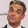Robbie Williams a reusit sa surprinda la un eveniment caritabil
